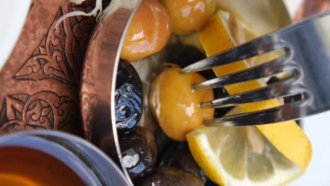 turkish meze with olives and lemon
