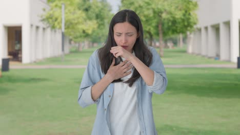 sick indian girl suffering from cold and cough