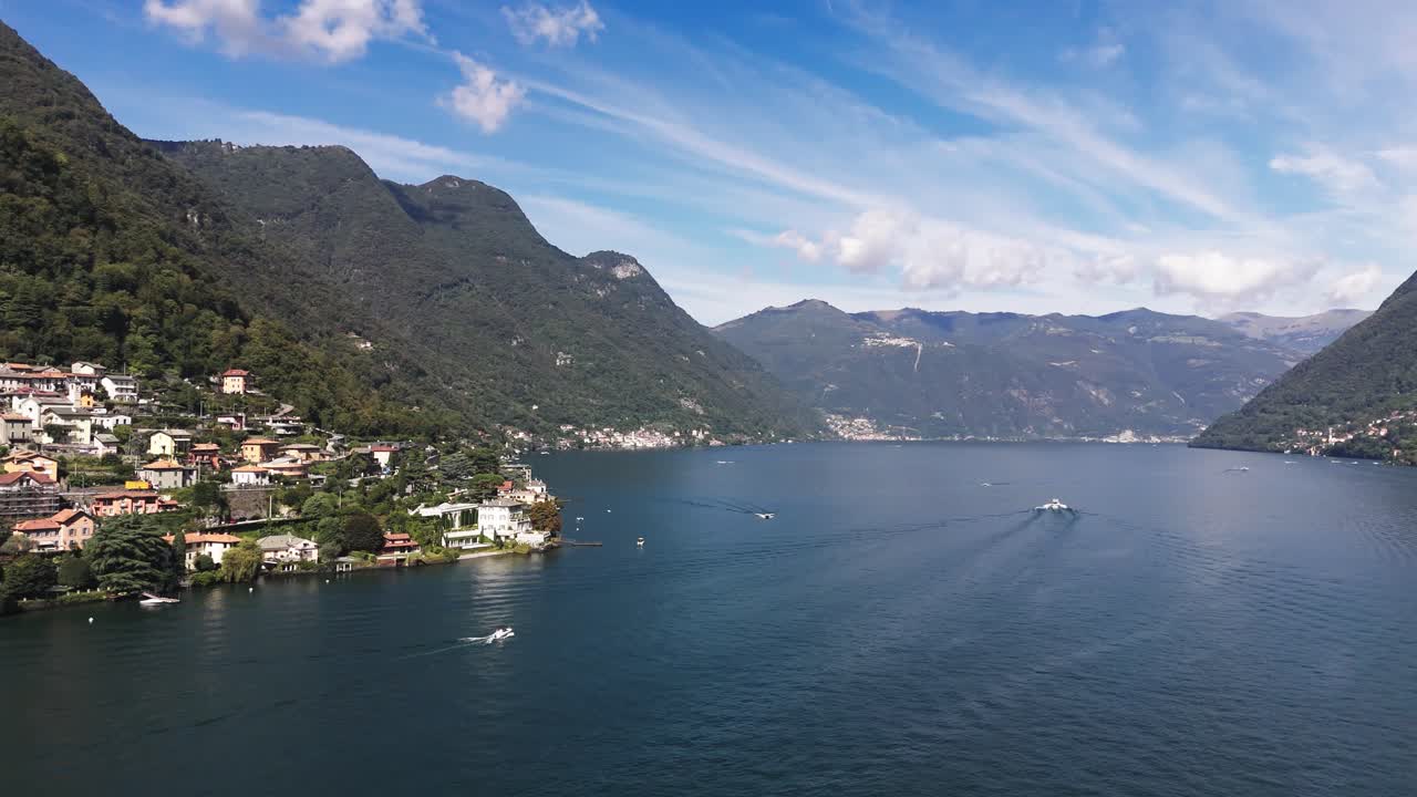 Lake Como, Houses by the water, boats and more, Italy