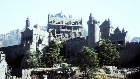 a stone castle in the mountains