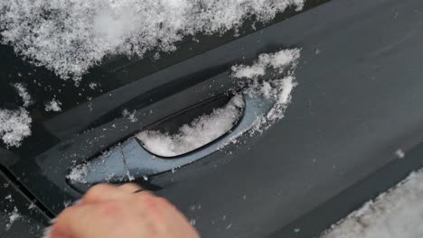 clearing snow frost ice to enter drivers seat pov