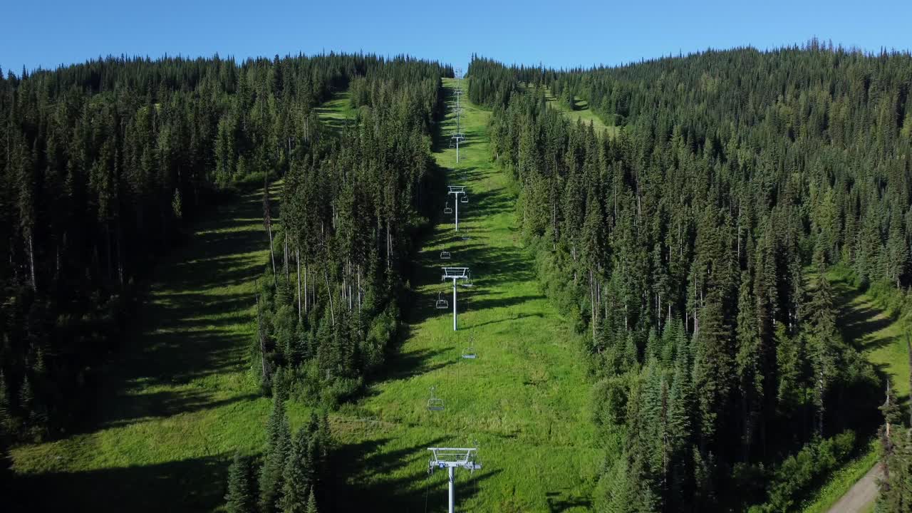 Drone Shot Chairlifts Over Ski Resort Alpine Mountains In British Columbia, Canada