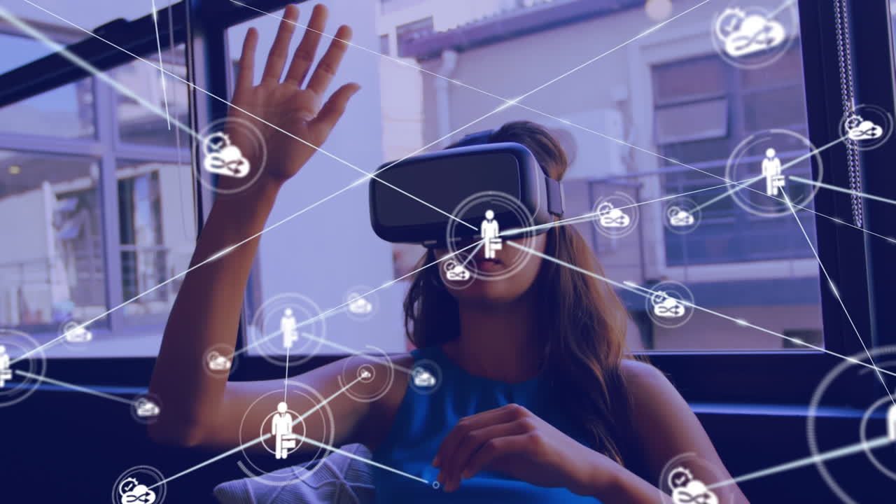 Animation of network of connections with icons over biracial businesswoman using vr headset