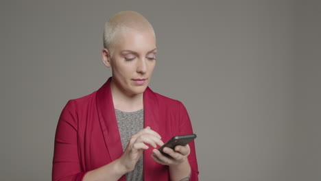 Female-model-posing-with-smartphone-during-studio-portrait-07