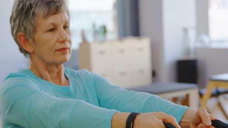 senior woman doing stretching exercise 4k