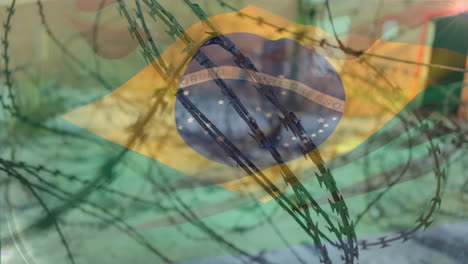 barbed wires against brazil flag