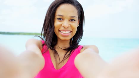 portrait of african american female on ocean beach