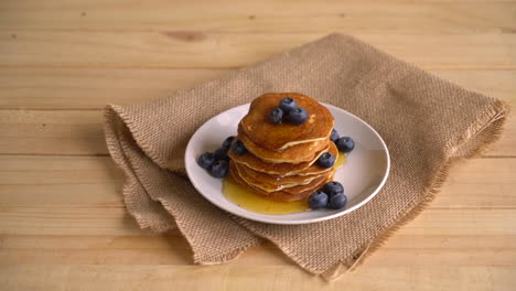 stack of pancakes with fresh blueberry