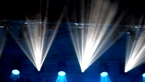 background footage of illuminated concert stage with smoke