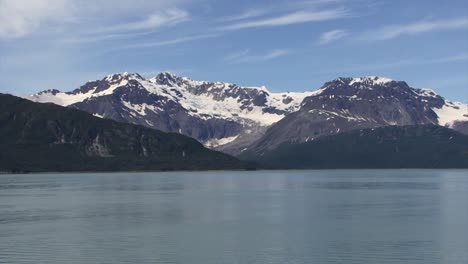 snowy mountain range on a sunny day in alaska