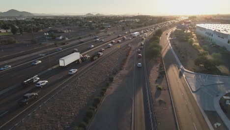 aerial view of busy freeway at sunset