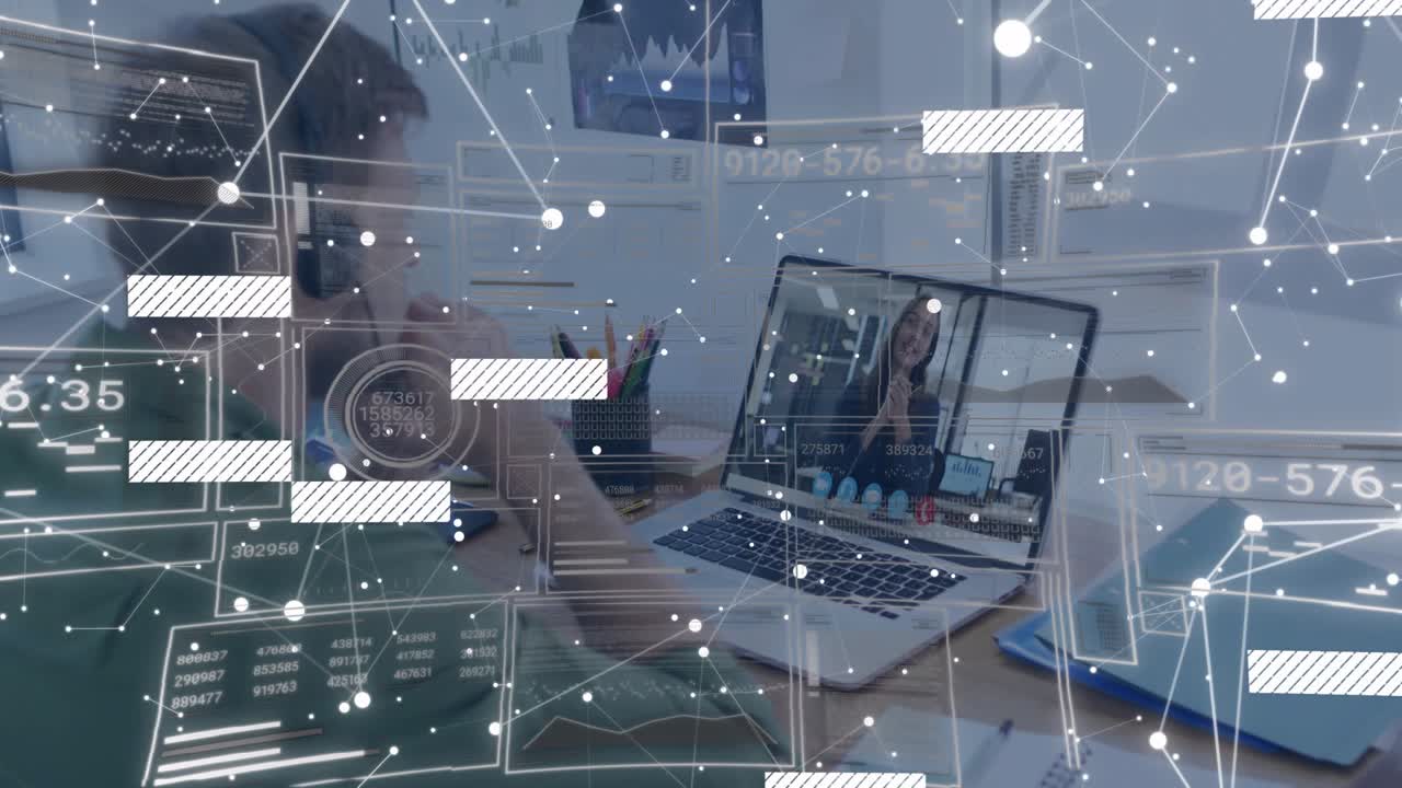 Vertical video: Adjusting green-shirt man with headset responding to call on laptop at desk, HUD