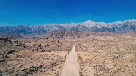 alabama hills in lone pine california 4k drone footage forward push over movie road with mount whitney in the background