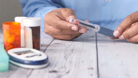 person injecting insulin for diabetes management