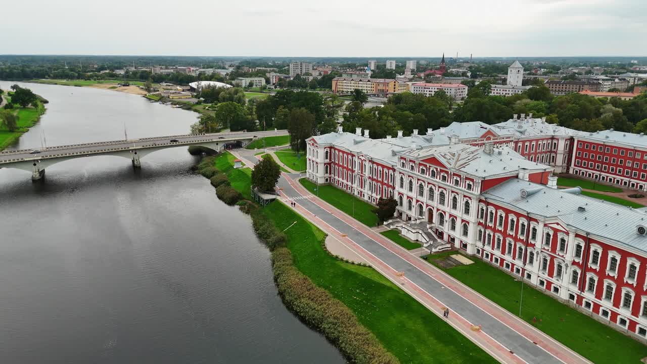 Aerial view of Jelgava Palace and river with bridge in Latvia cityscape