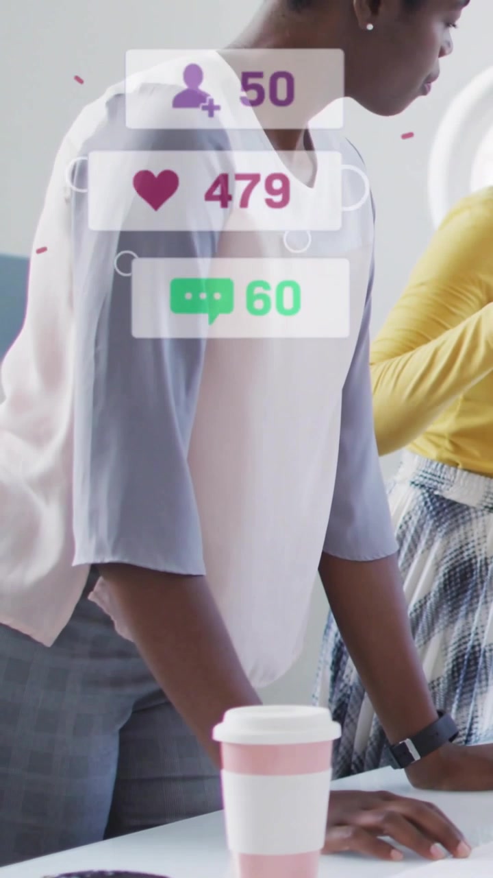 Vertical video: Woman leaning on table scanning in marketing, cursor clicking updating heart counts