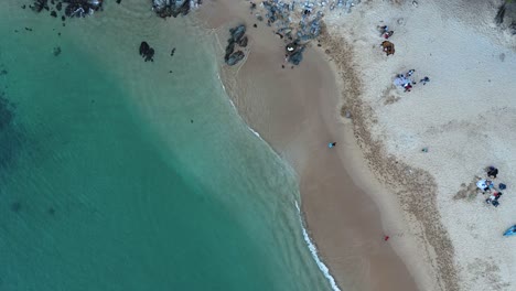 Slow-motion-beach-views-in-Huatulco,-Oaxaca.-Aerial-view