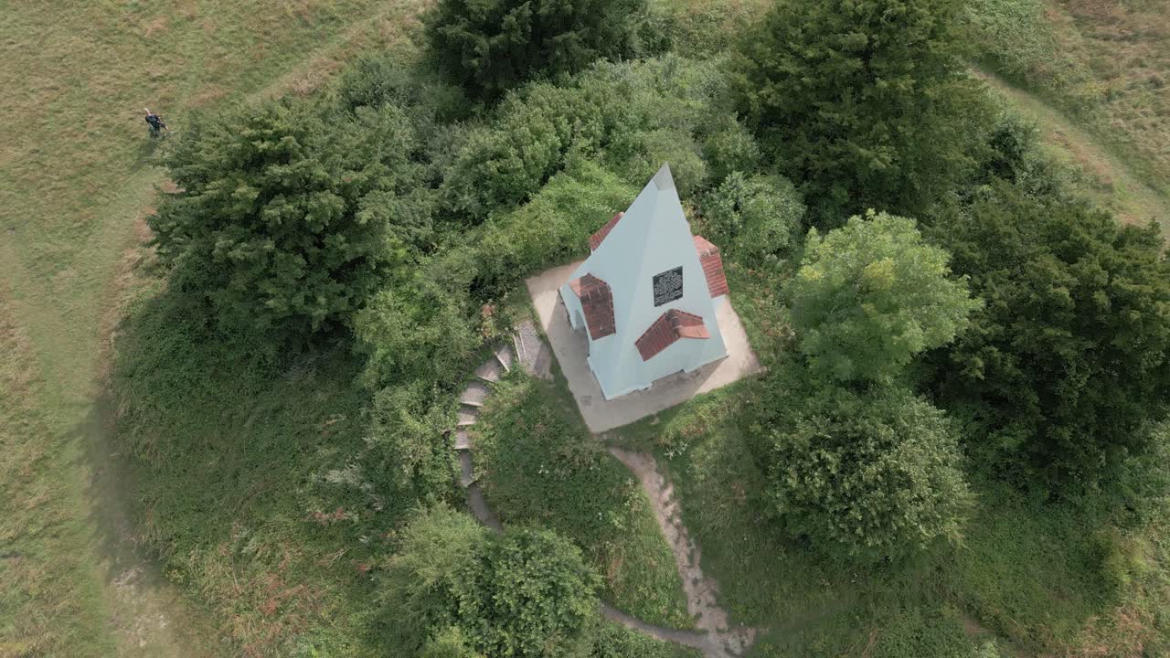 Aerial view looking down over Farley mount white pyramid monument on Hampshire country park hilltop