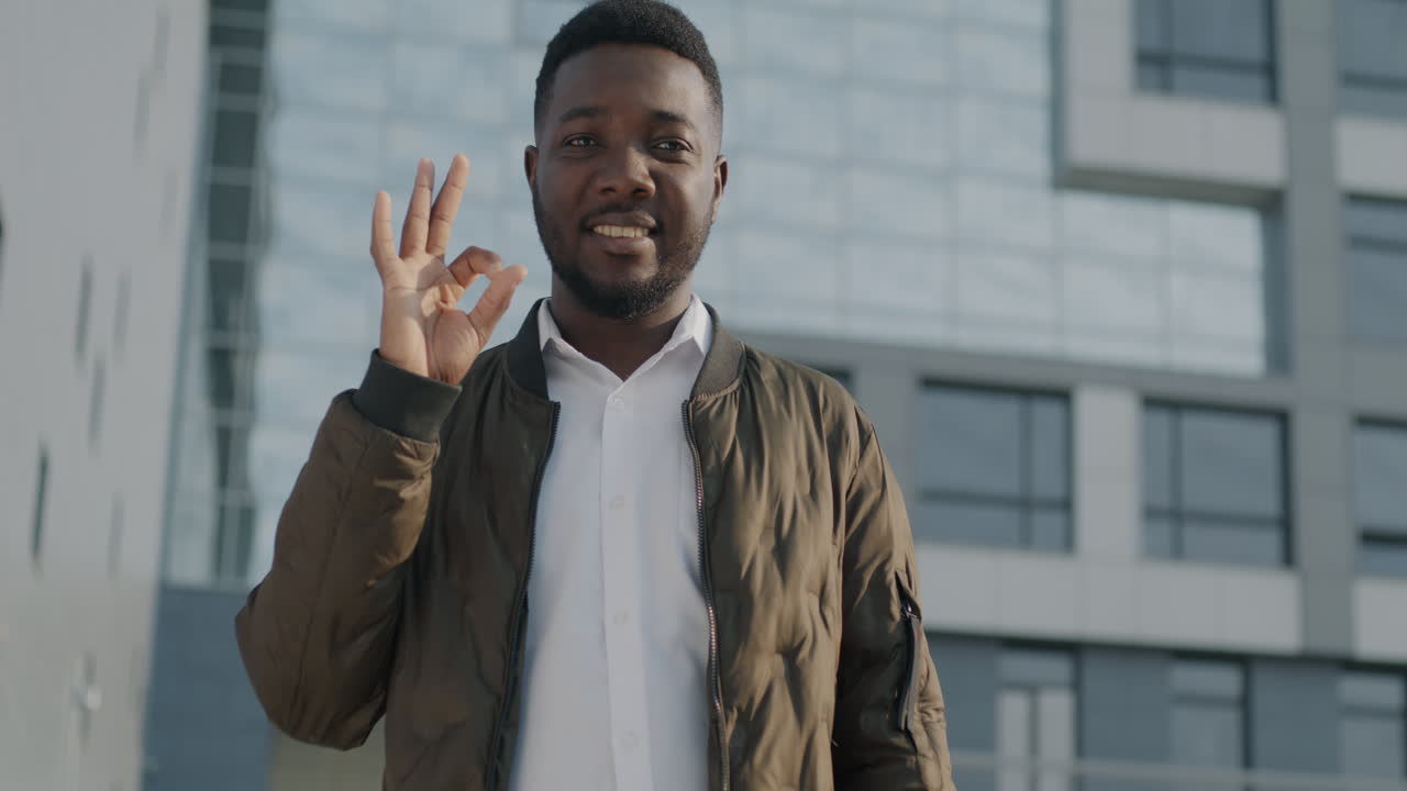 Smiling Man Giving Ok Sign