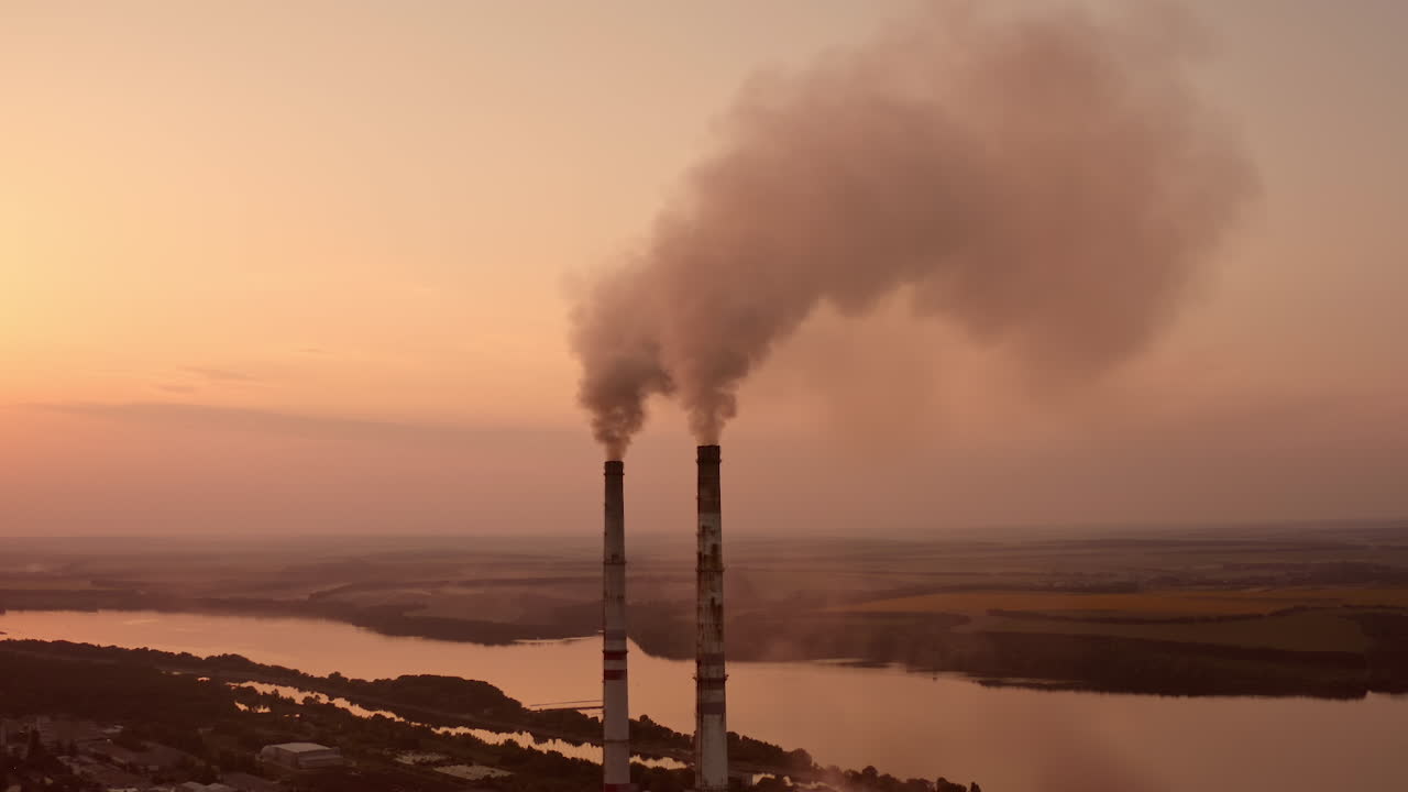 Factory construction engineering. Industry factory gas tubes on sunset.