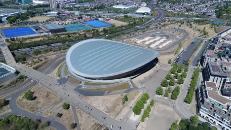 london aquatics centre and landscaped garden, stratford futuristic landmark attraction aerial orbiting view