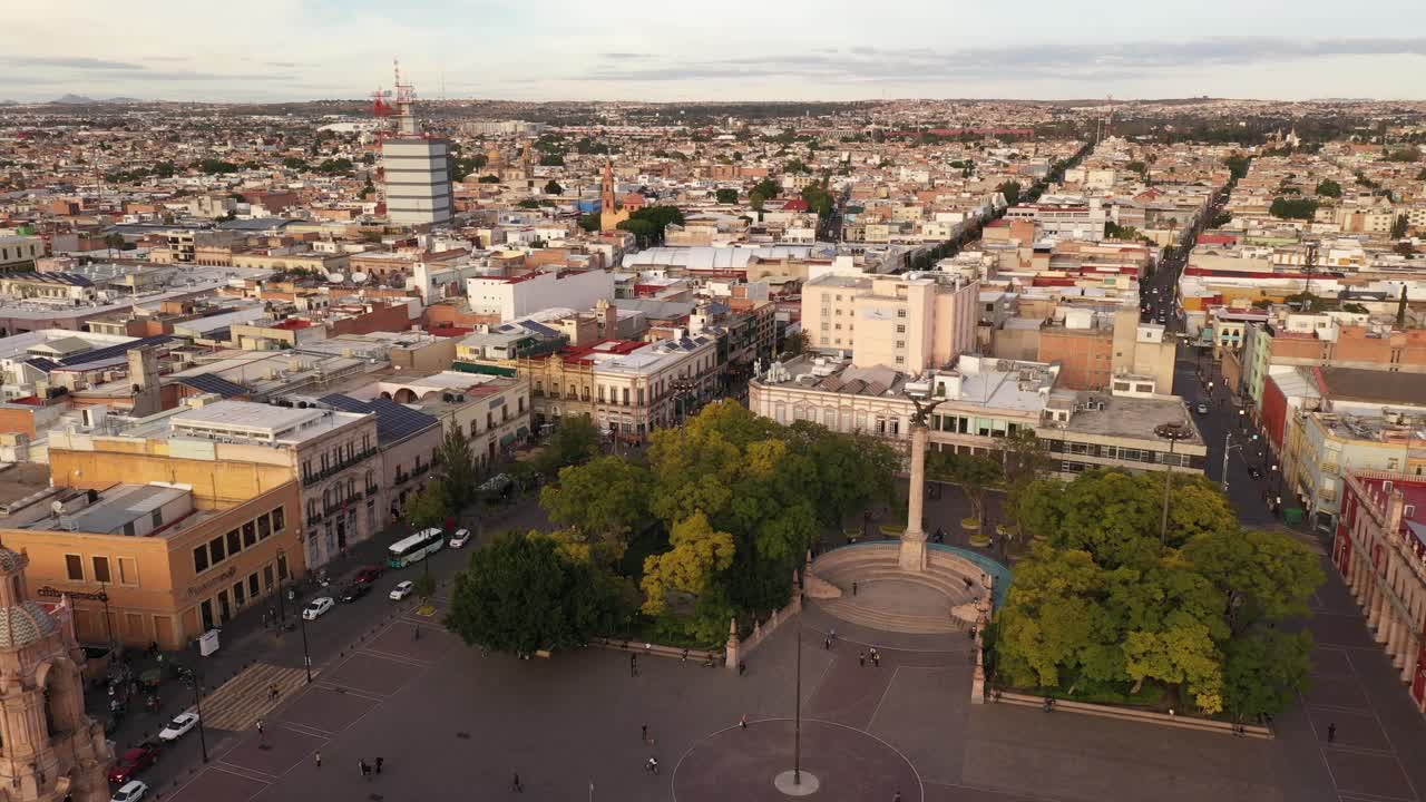 Big square in Aguascalientes Mexican downtown. Aerial dolly in