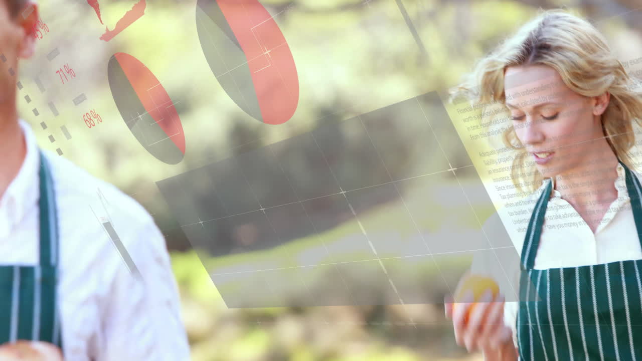 Woman in apron holding orange with data processing animation overlay