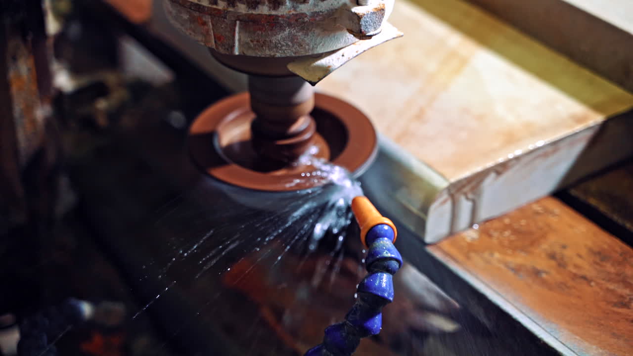 Cutting granite closeup. Detail of a circular saw used to cut granite