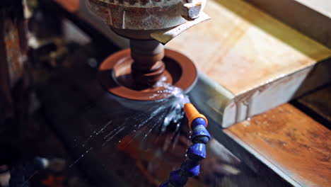 cutting granite closeup. detail of a circular saw used to cut granite