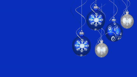 animación de bolas de árbol de navidad sobre fondo azul