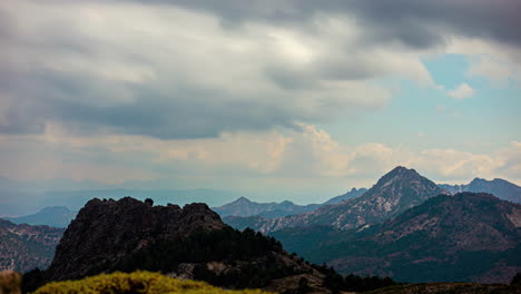 timelapse shot of dark cloud movement over mountain range in malaga andalucía, spain on a cloudy day