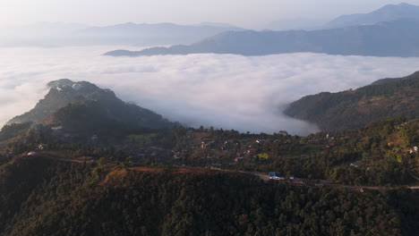 aerial view of the gyarjati neighborhood in the hills of pokhara, misty nepal