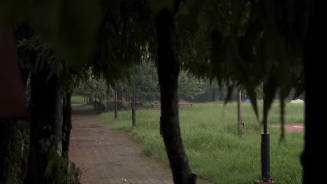 Early-morning-view-of-a-footpath-in-Manachira-Square-in-Kozhikode-or-Calicut,-Kerala,-India