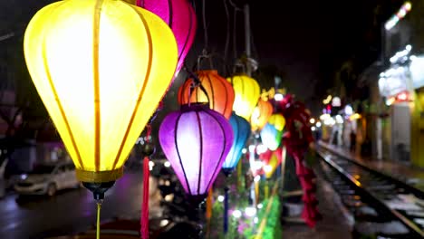 vibrant lanterns light up a bustling street