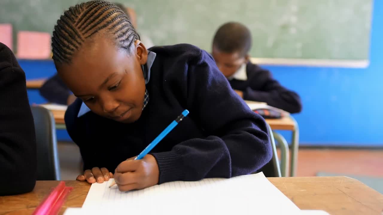 Schoolkid studying in the classroom at school 4k