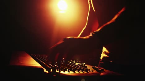 man using dj mixer at nightclub 4k