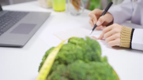 diet program. nutritionist prepared food diet. fruits and vegetables on the table.