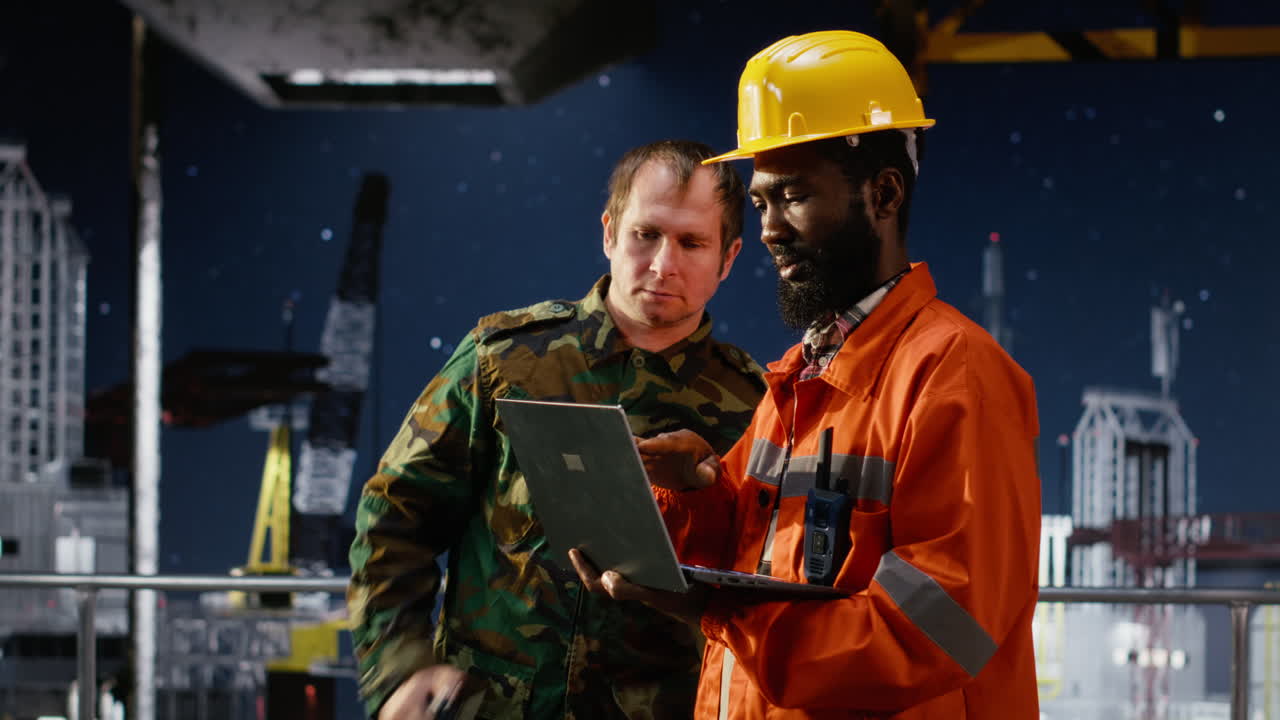 Naval soldier communicates via radio during offshore drilling operation