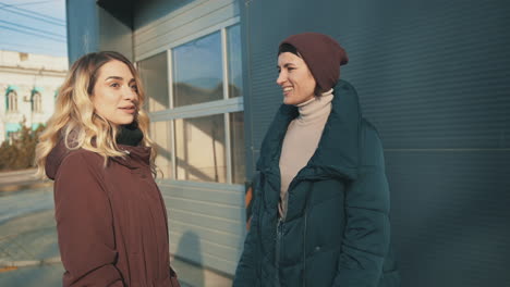 female friends talking in the street