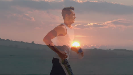 composite of caucasian man jogging and sunset sky over countryside