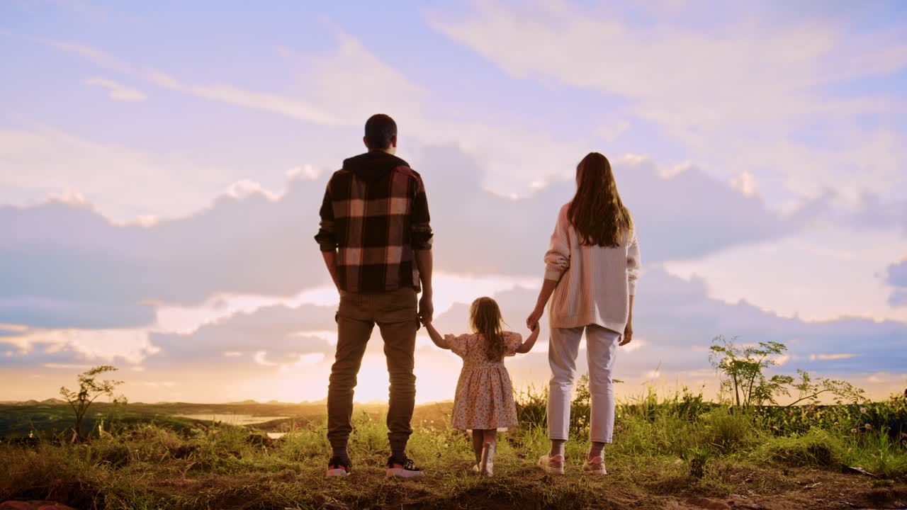 Family enjoying a sunset view