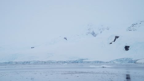 Antarctica-Ocean-Winter-Seascape-with-Snow-Covered-Icy-Scenery-and-Cold-Weather-Winter-Scene,-Antarctica-Peninsula-Scene-with-Sea