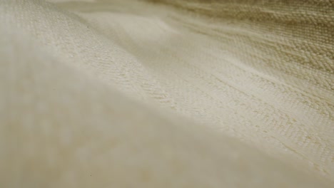 a captivating view of luxurious plush green fabric that highlights its incredibly soft texture and vibrant color
