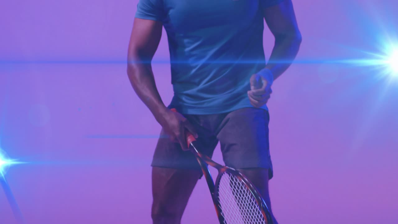 Male tennis pro shifting weight, adjusting grip, swinging racket for promo with flares adding swing