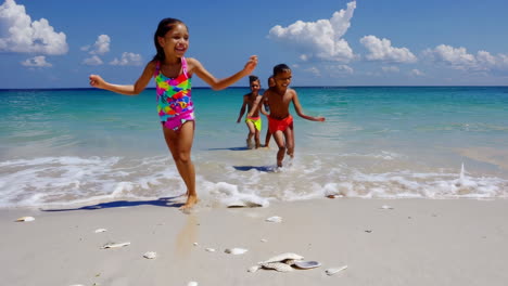 children playing at the beach
