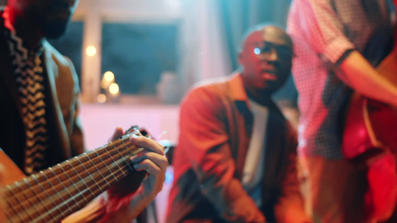 Man Playing Guitar on Concert