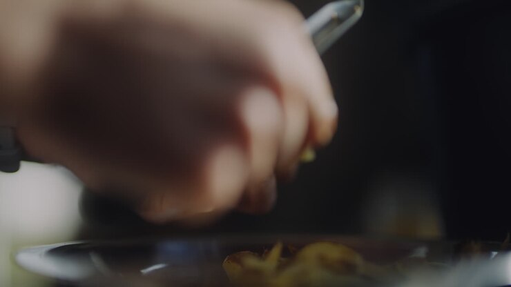Close Up On Woman's Hands Peeling Potatoes Close Up Peeling Potatoes
