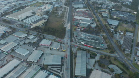 slow tracking drone aerial perspective tracking along new train line development