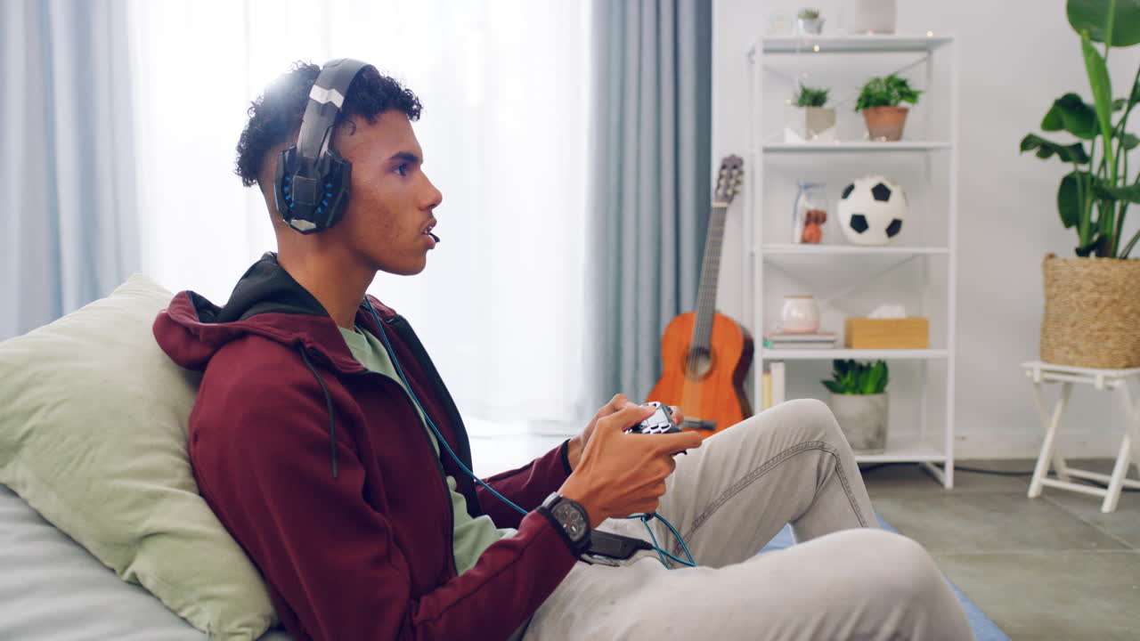 콘솔 비디오 게임을 하는 젊은 게이머