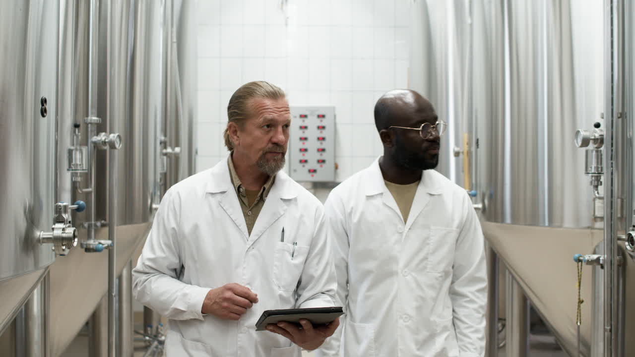 Two men in a factory